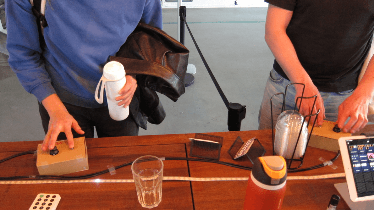 Strangers interacting with each other during a test in café Analog (ITU)